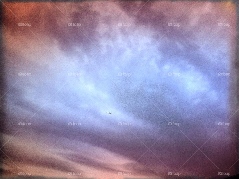 Jet flying through clouds