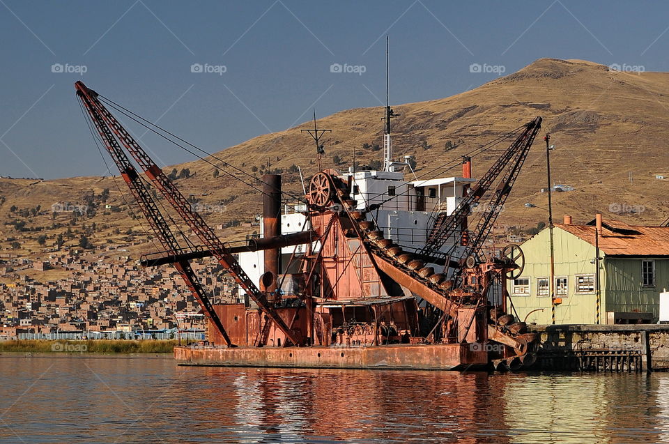 Dredge in Pump Harbour, Puno, Peru.