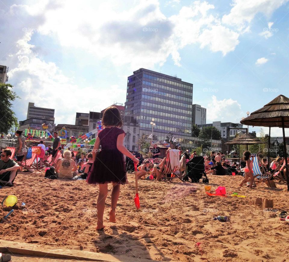 Nottingham Riviera, temporary artificial urban beach and fairground in the Old Market Square, Nottingham city centre UK