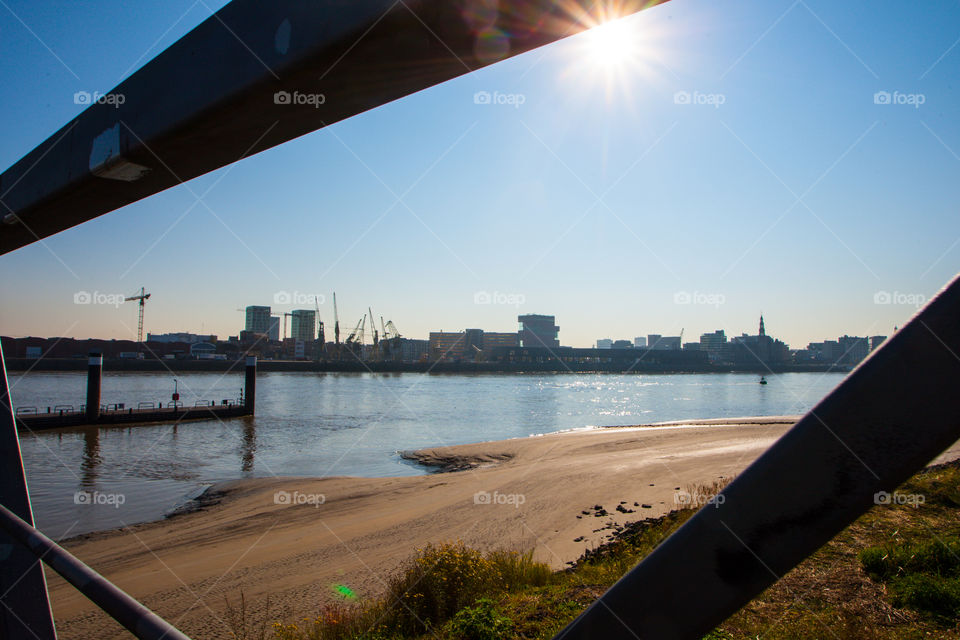 Riverside landscape under the sun