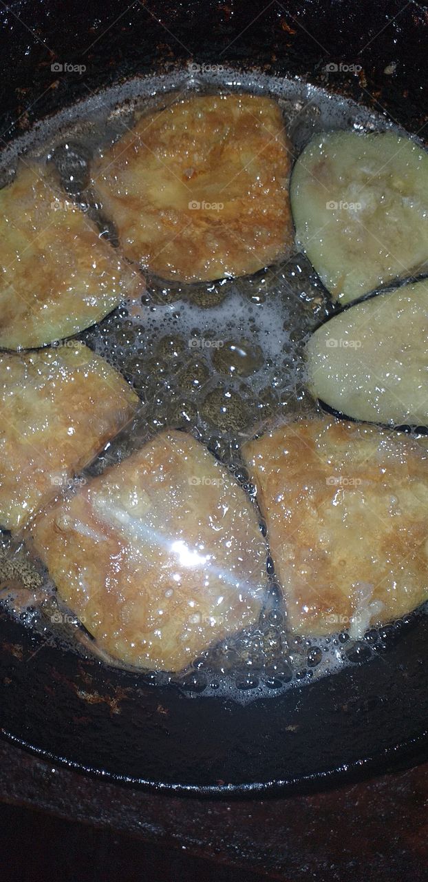 I am cooking a delicious salad with eggplant and eggs