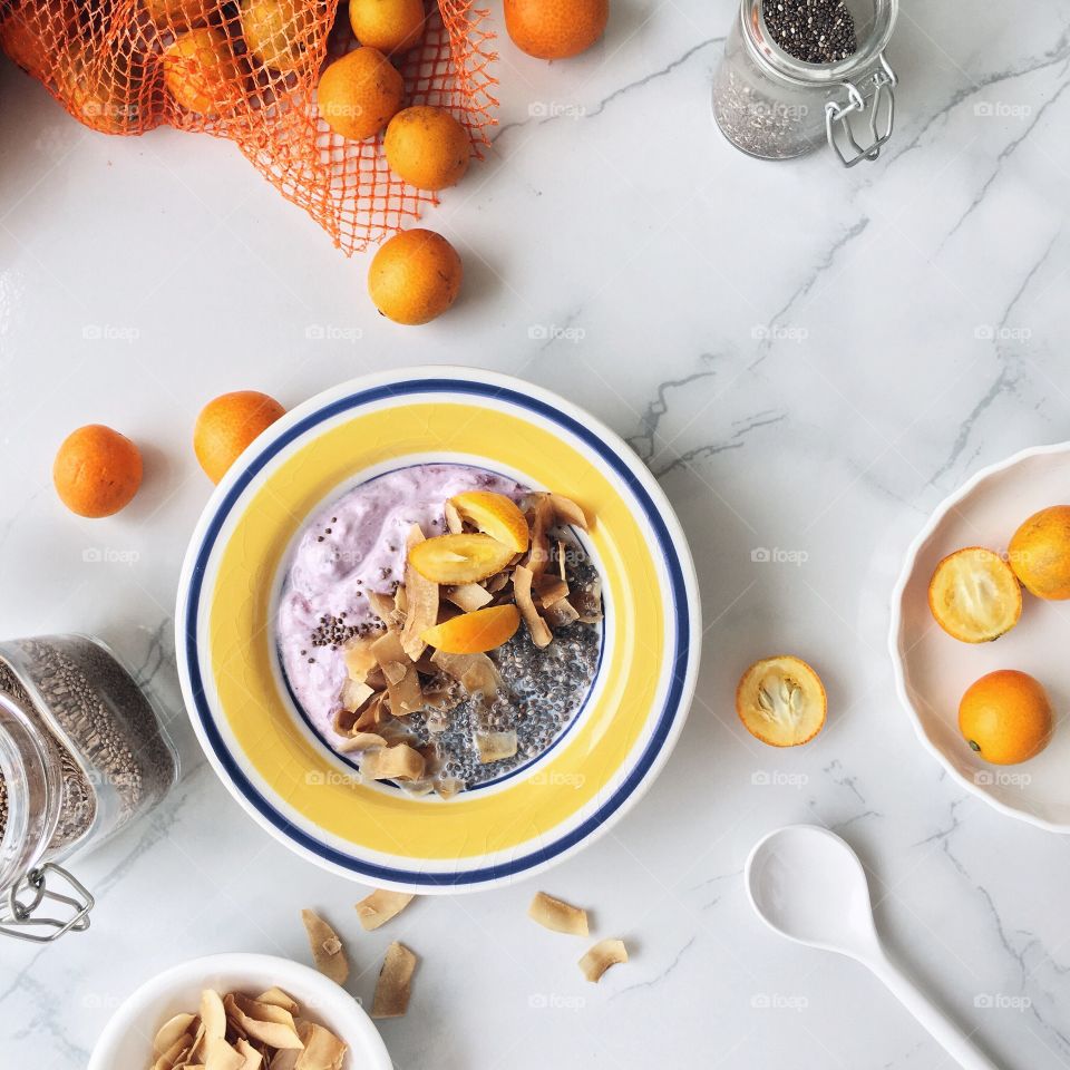 Fresh Fruit Smoothie : Blueberry smoothie with kumquats, coconut chips and chia seeds