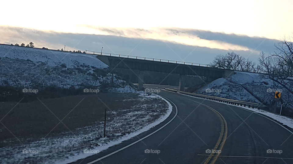 Hwy bridge, snow,ice, sky,