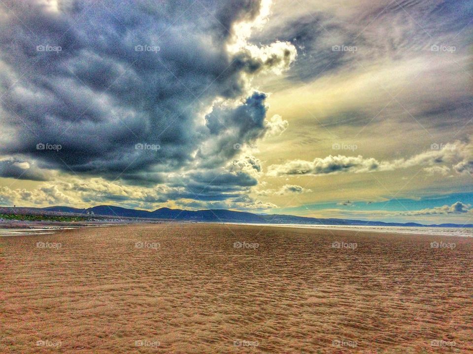 Cloudy day on the beach in wales