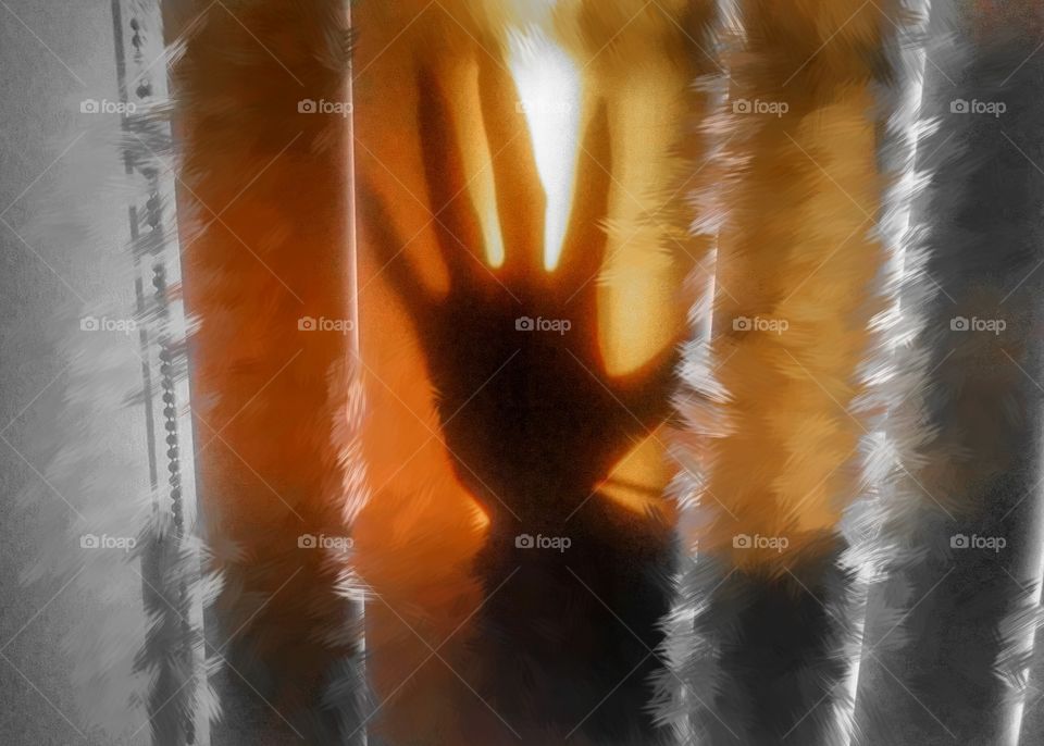 Silhouette of my hand against blinds edited
