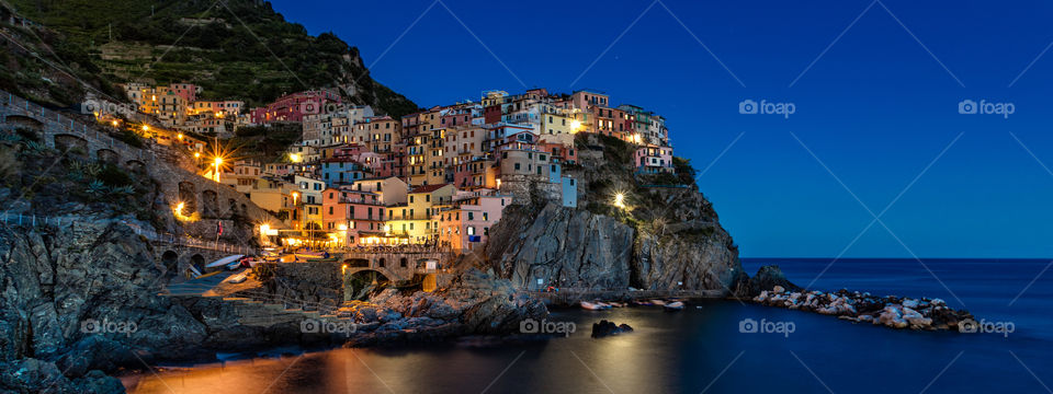 Illuminated view of manarola village