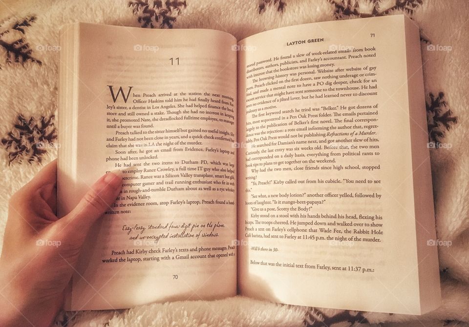 Snuggled up reading a book on a cold winters day 