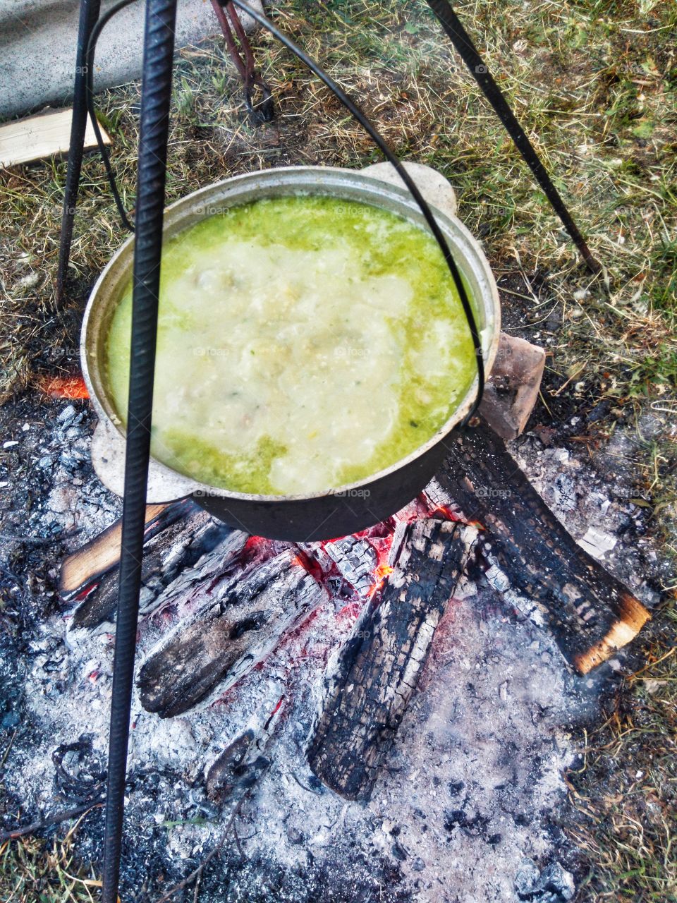 Field porridge on the fire, homemade food is delicious. Made with love.