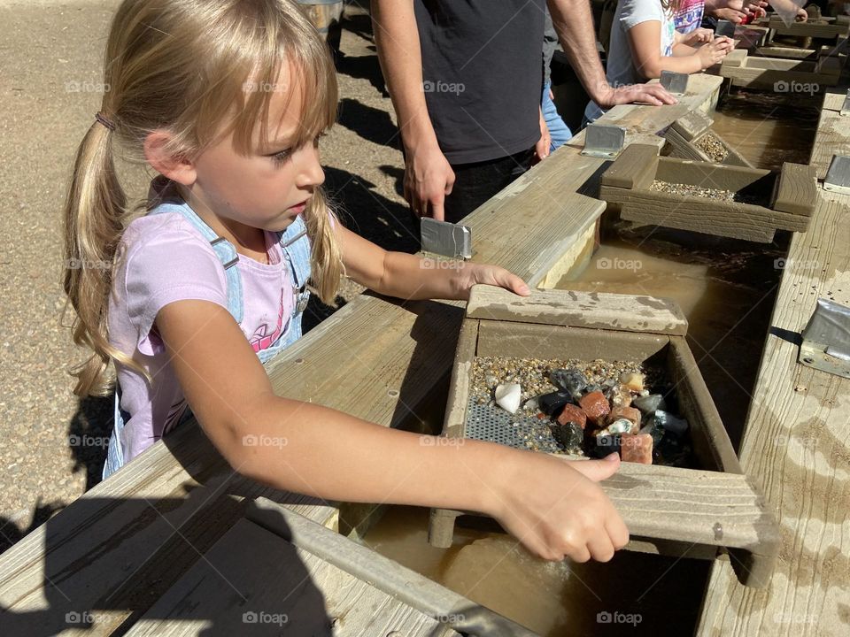 Little girl gym stone mining 