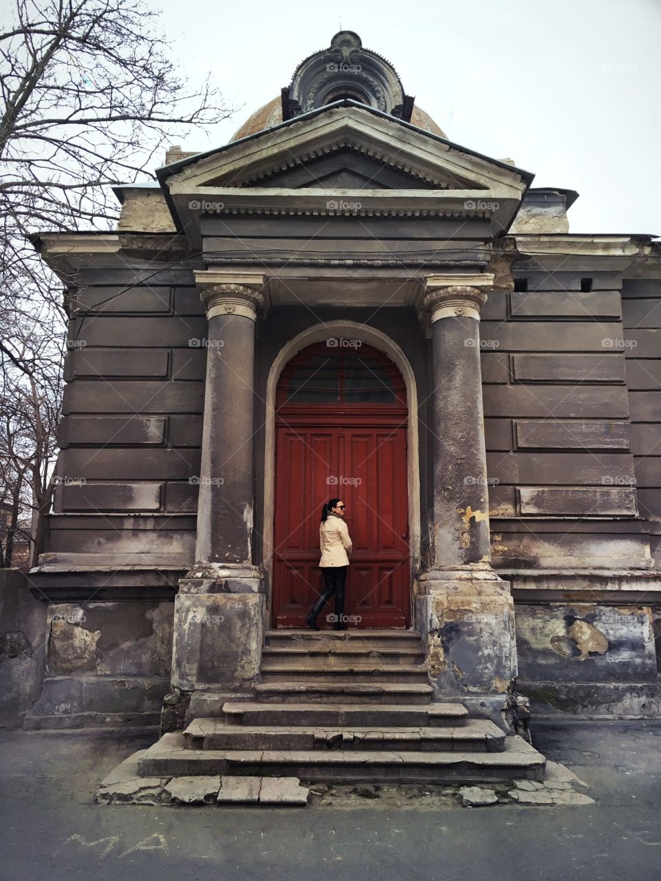 Girl near red door