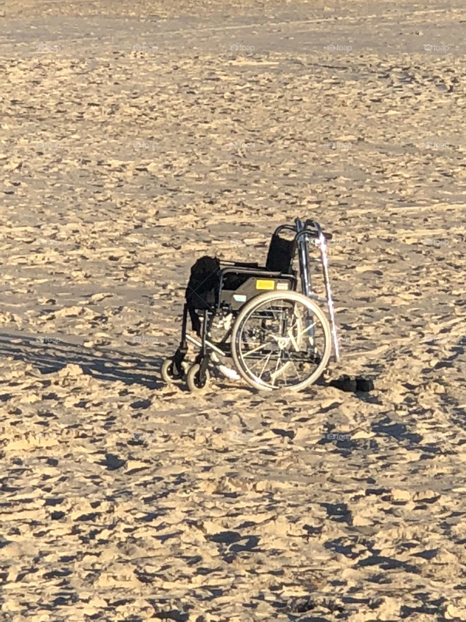 Wheelchair on the sand