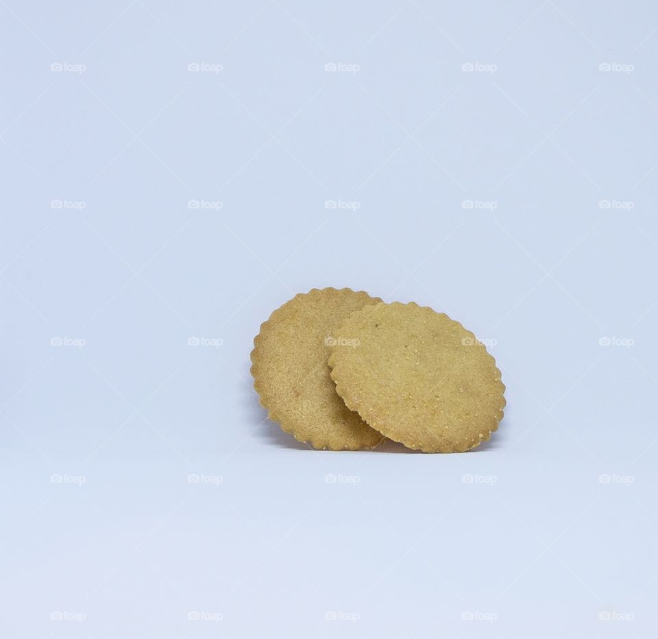 Brown cookies on white background 