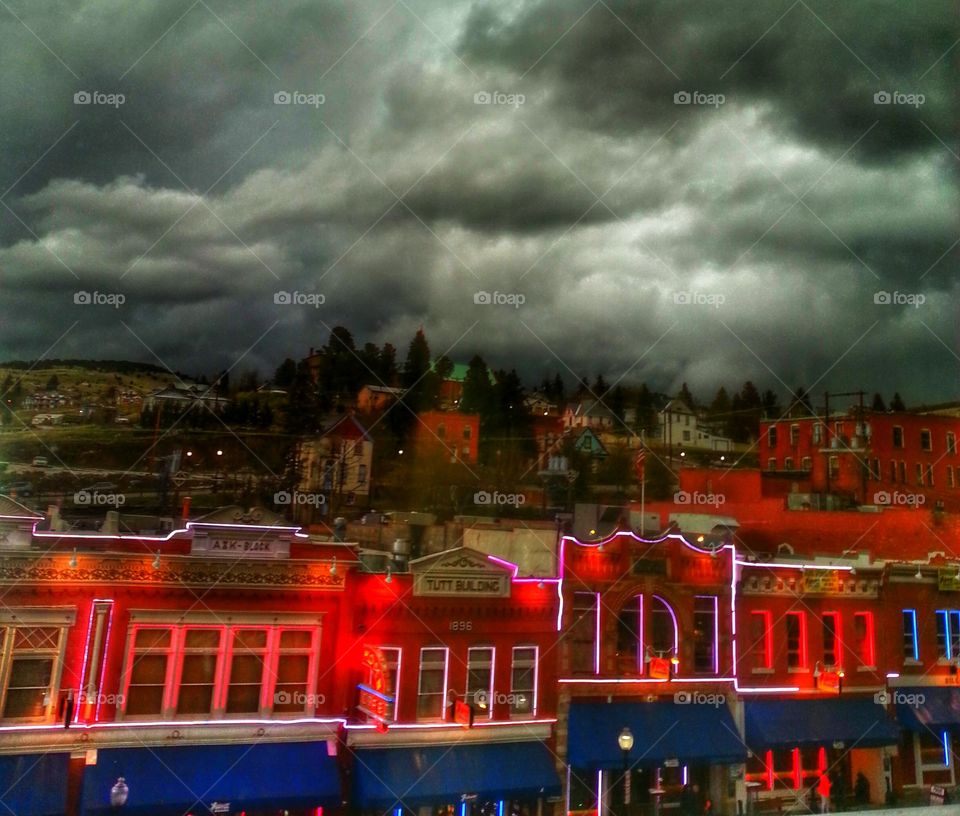 Cripple Creek Neon. storm in Cripple Creek Colorado...down lit up with neon lights.