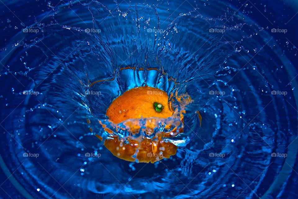 Orange falls in blue water 