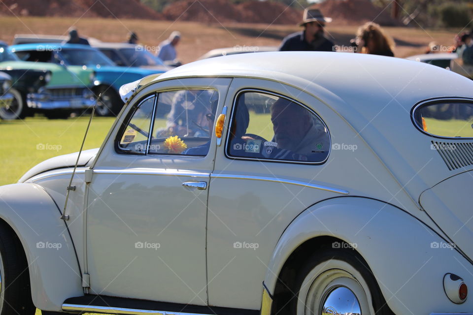 Vintage cream Volkswagen Beetle car classic car show outdoors