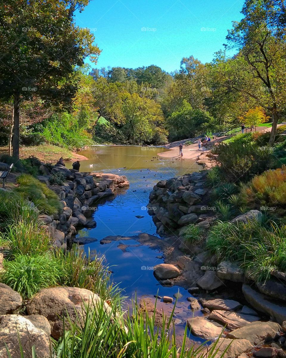 Blue sky reflected in river