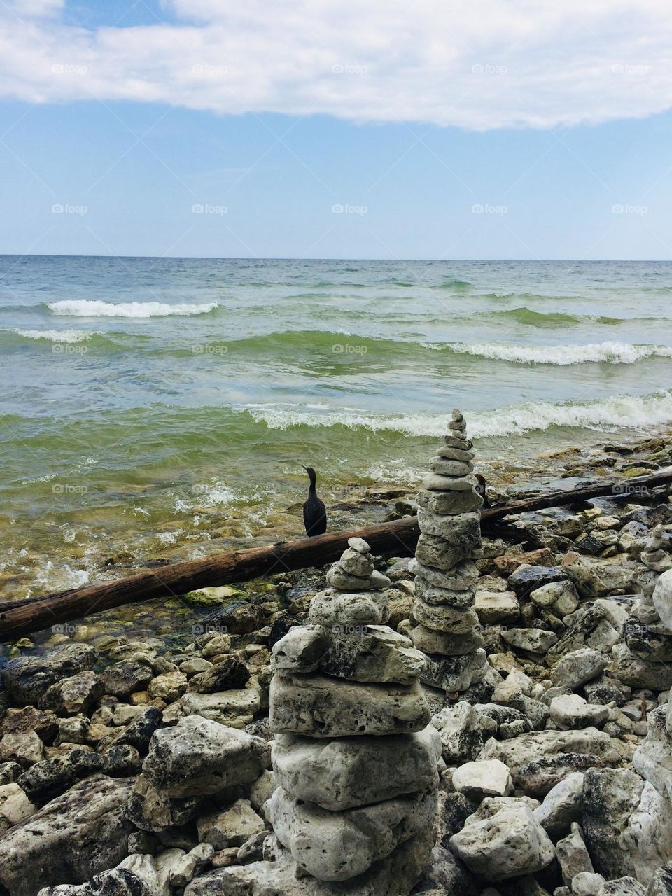 Rock cairns on the lakeshore