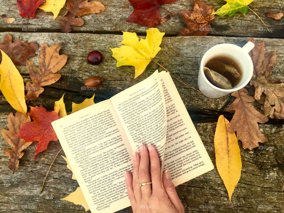 Cup of hot tea in autumn