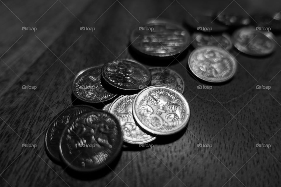 Coins on the table-monochrome image.