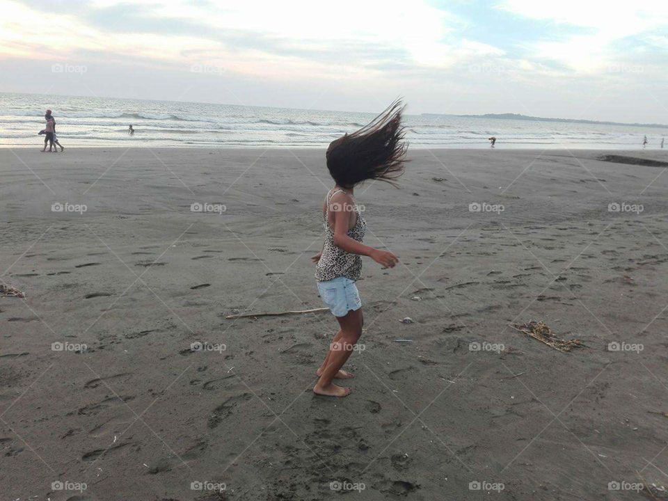 a stroll in the beach, playing