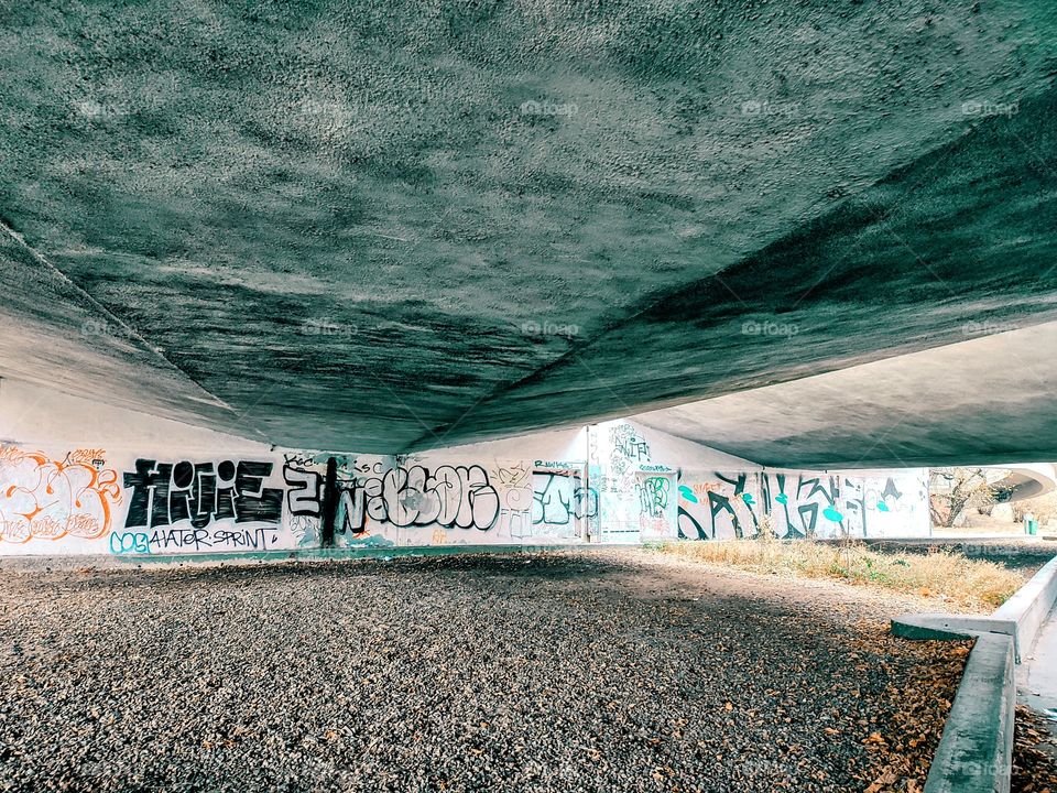 Graffiti under the bridge.