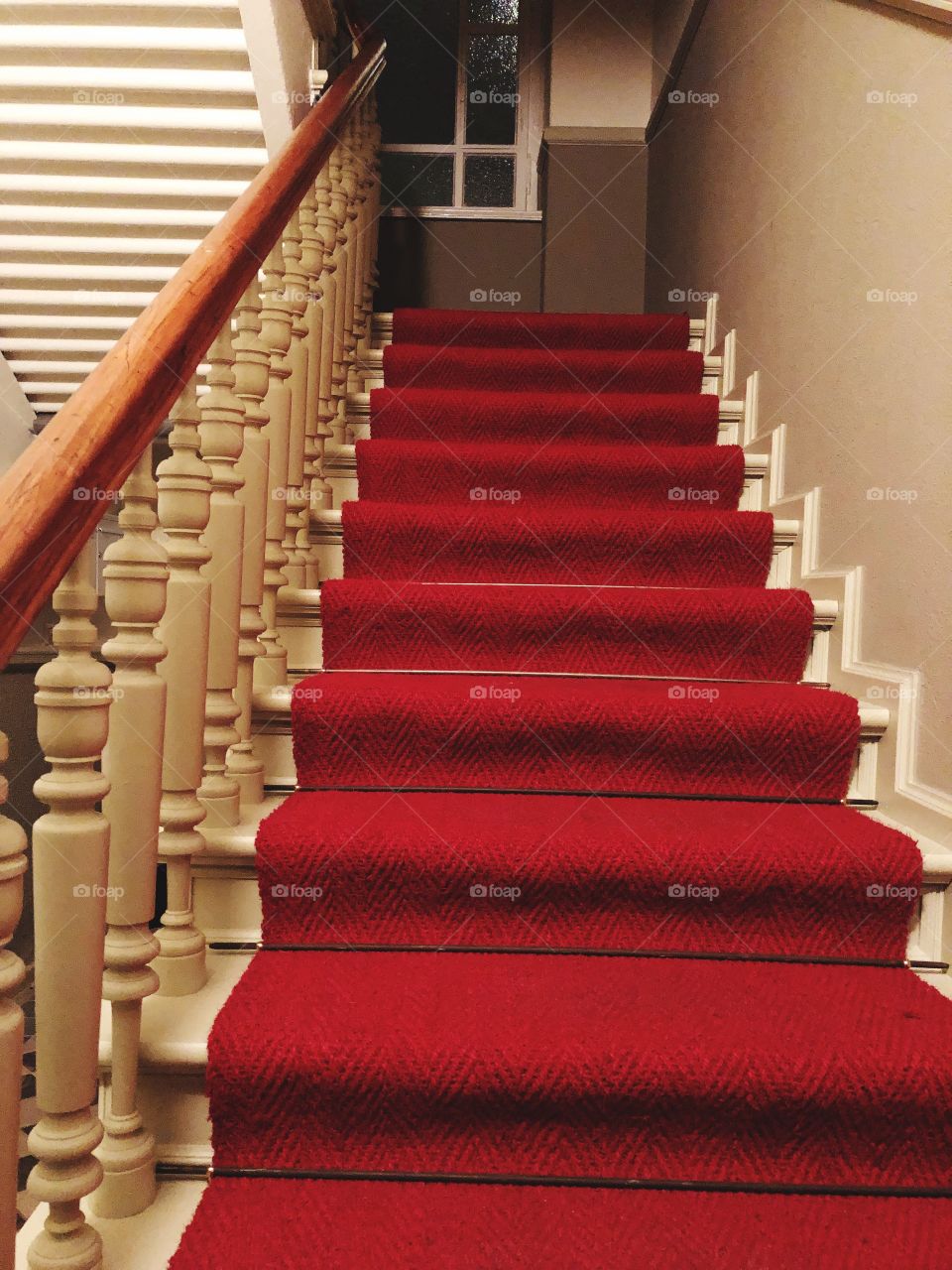 Staircase with a red carpet