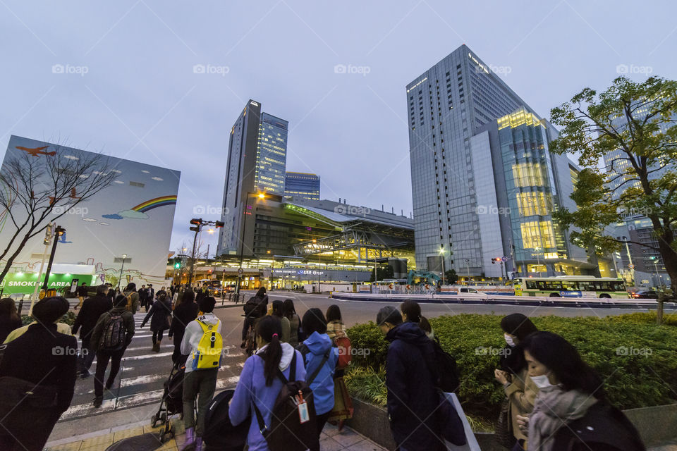 People traveling in Osaka train station 