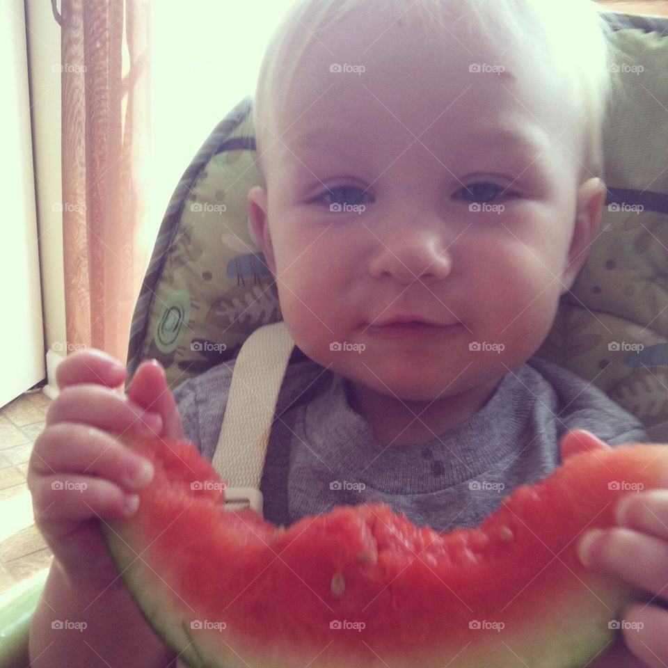 Sweet baby enjoying mid day snack!