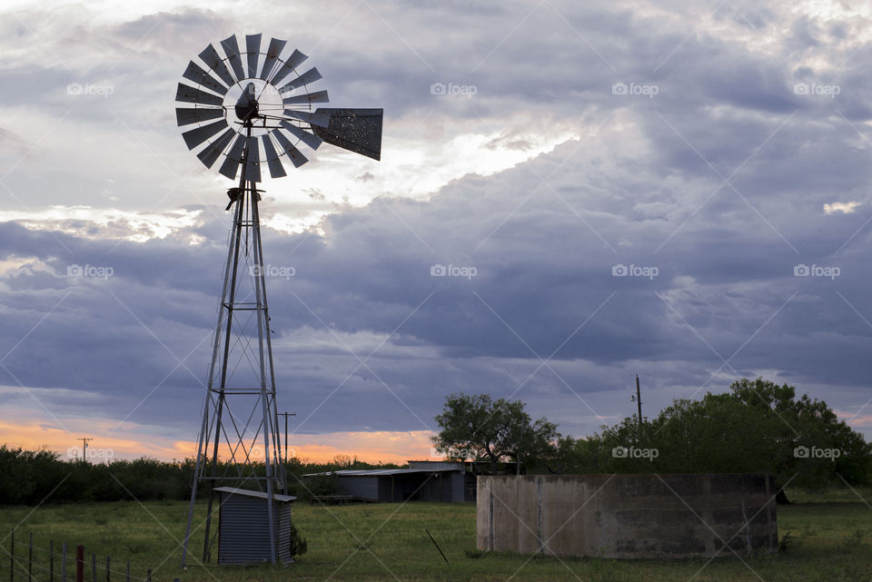 Windmill in south west Texas sunset.