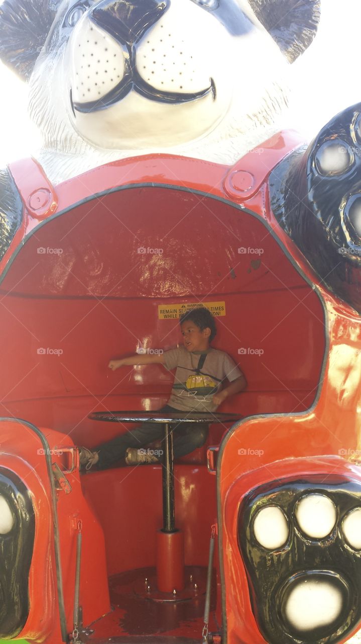 ninja rider. son being a ninja on the carnival ride