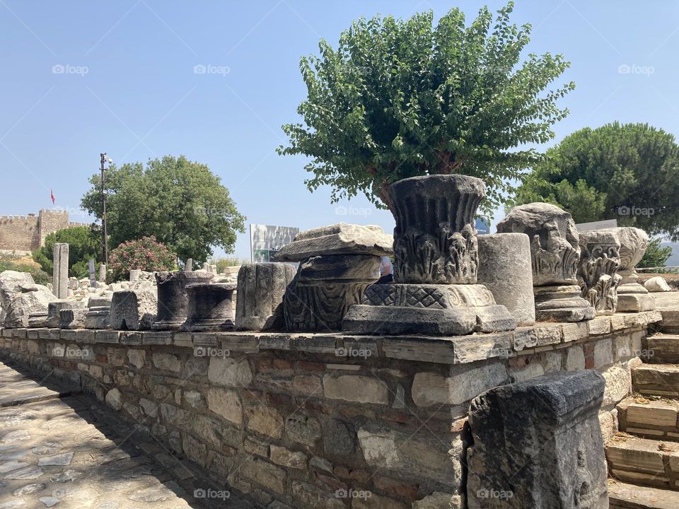 Ancient ruins Sunny holidays I’m Turkey. Walk in the cute city and charming streets by the beach in Kusadasi. perfect blue sky and ocean view. Beach and the shore. To travel is to live. Gorgeous tall palm trees.