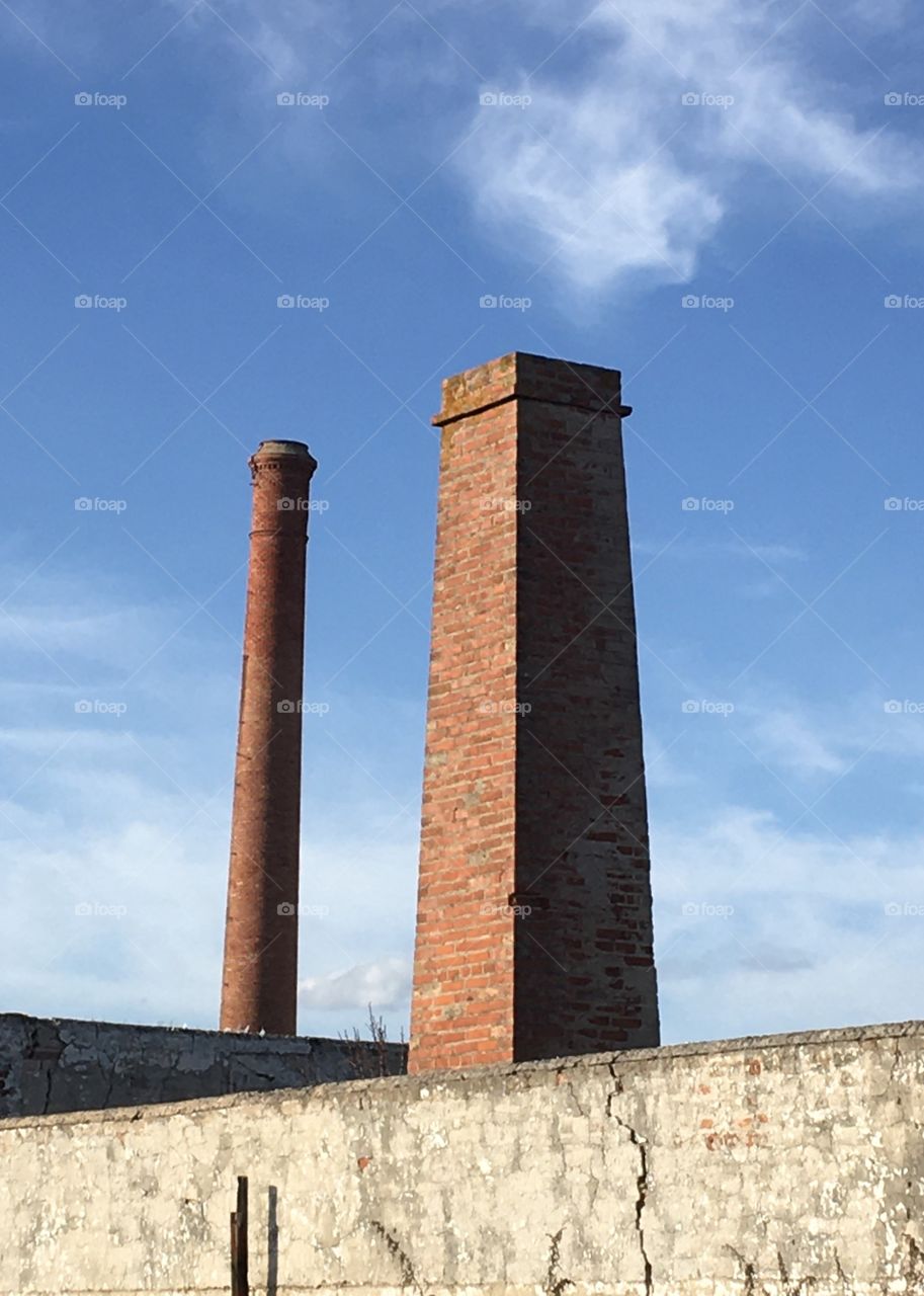 Cloud like smoke above old chimney 