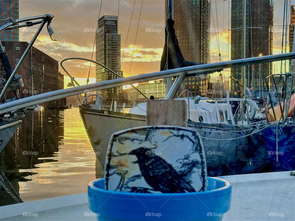 This is beautiful “Newtown Creek” by the “Pulaski Bridge” in LIC, Queens at sunset time seen from “Salvation”, the “28 foot 1969 Luhrs” cabin cruiser that is home to myself and my longtime partner “Timothy Trespas”. 2024. Hypnotic Productions