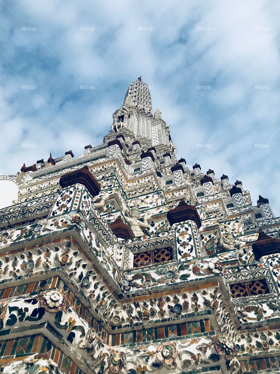 Beneath the sky but look like it can touch 