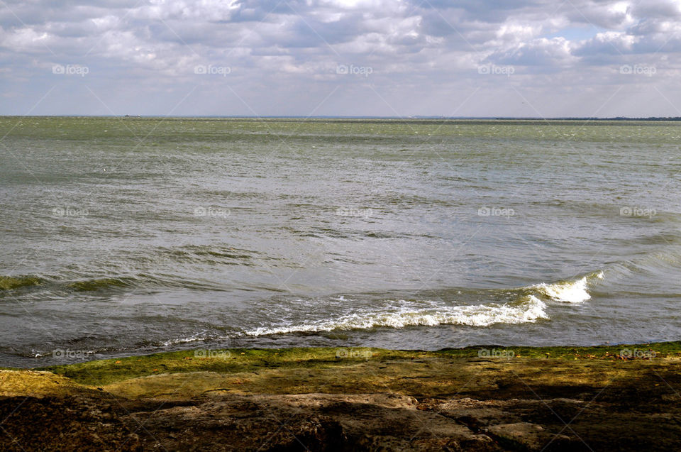 ohio lake rocks waves by refocusphoto