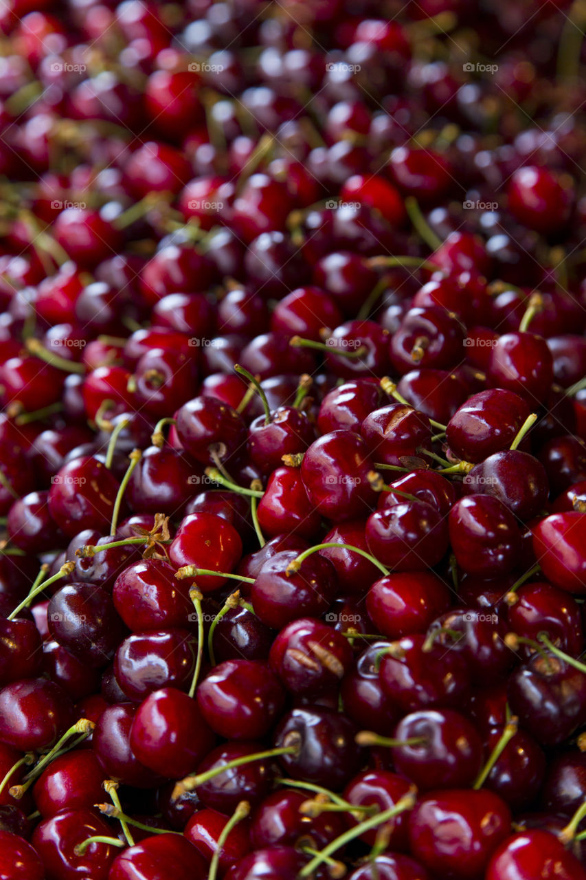 RED CHERRIES . Bunch of yummy red cherries at the market