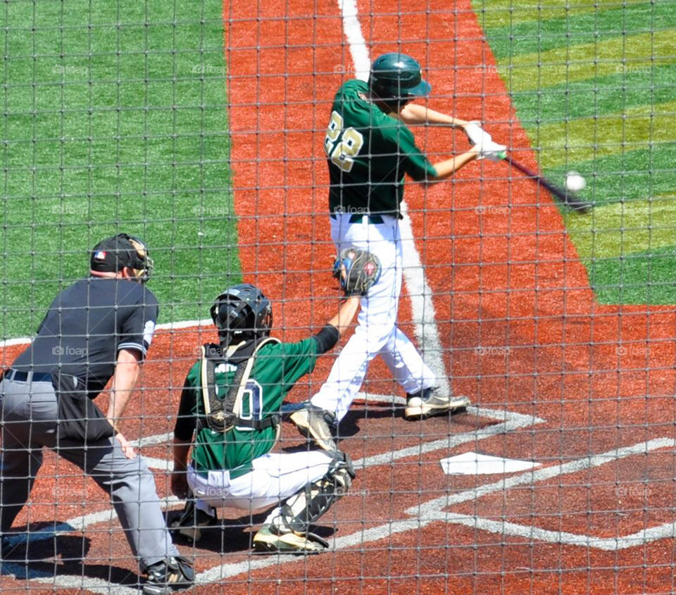 Batter up!. Baseball tournament at the University of Maryland.  That's my 6' 8" baby up to bat! 