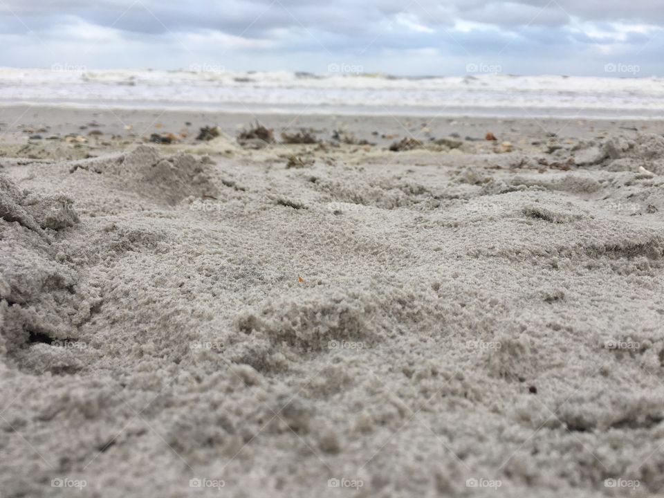 Sand shot near the ground at beach 