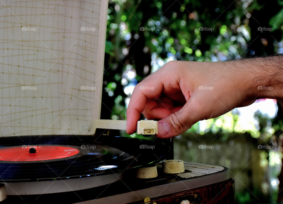 Record player, music in the back yard