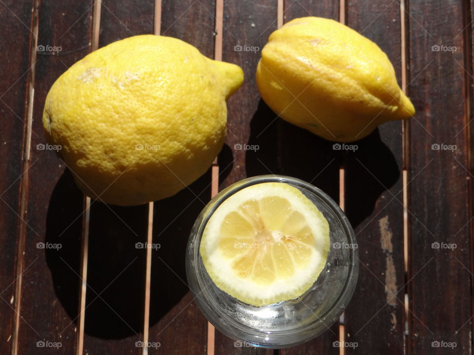 Lemons with lemon juice
