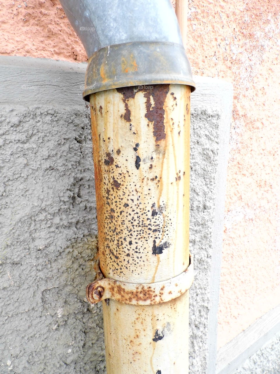 rusted pipes are caused by long life or rain wet