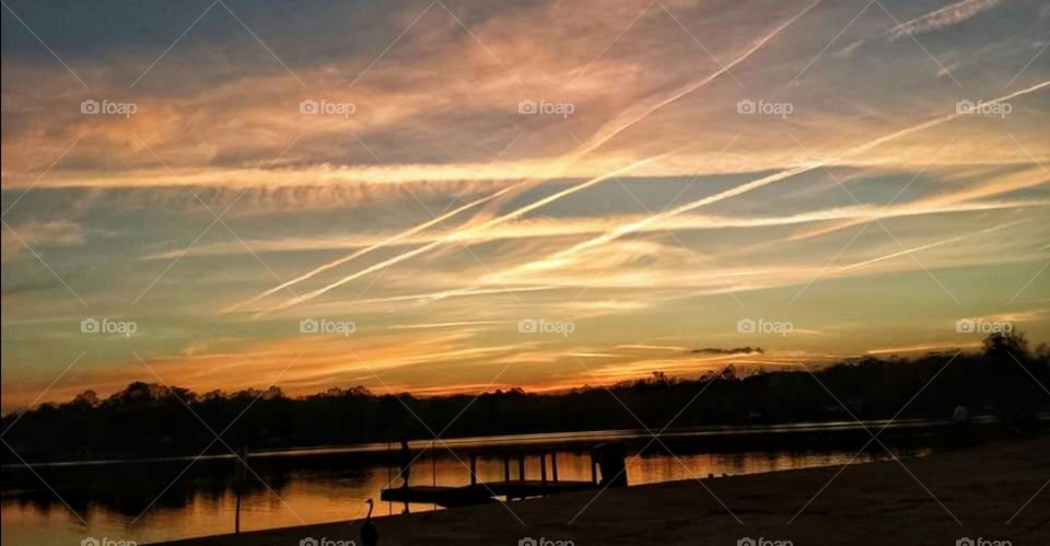 Scenic view of lake during sunset