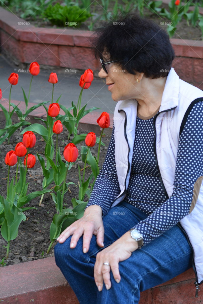 happy woman and tulips spring