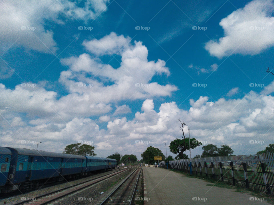 landscape beauty blue sky with clouds nature train station