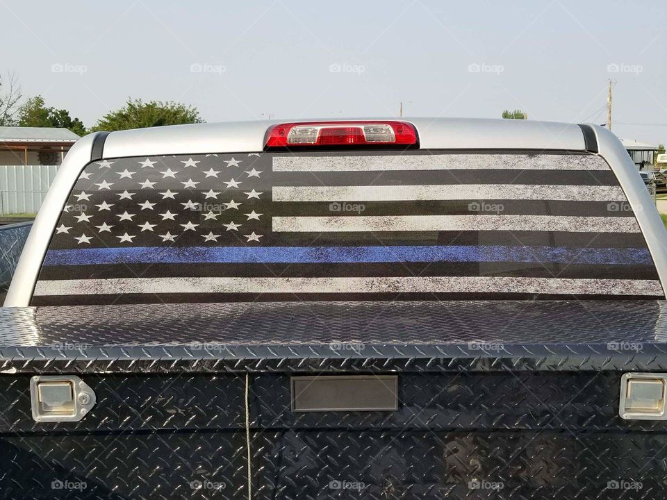American flag with thin blue line.