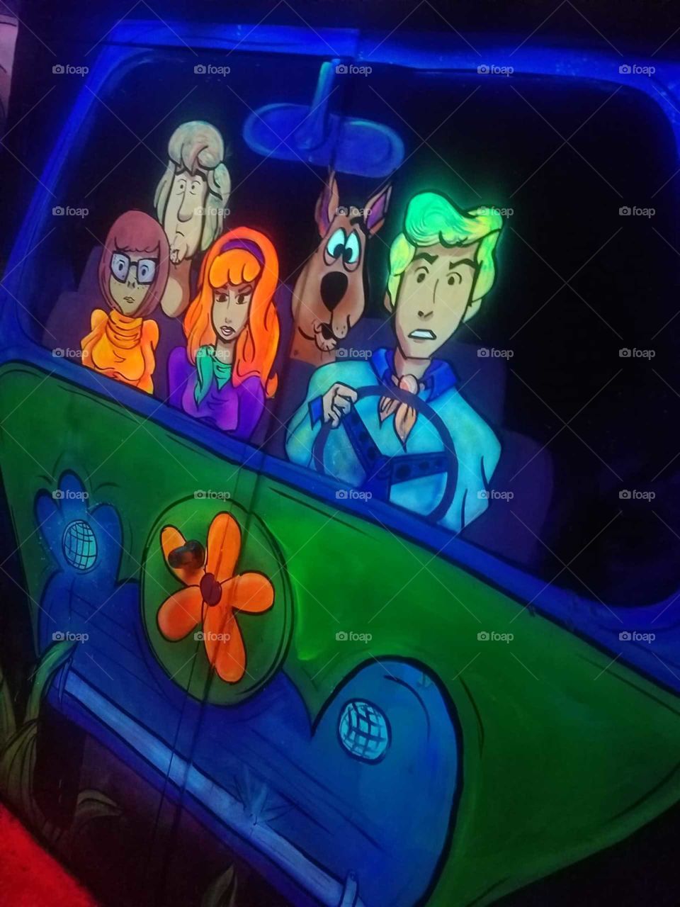 Joysticks Lounge is an amazing retro bar/arcade located in Orlando, Florida. It is bright, colorful, vivacious and has its fair share of visitors including Scooby Doo and his gang! 