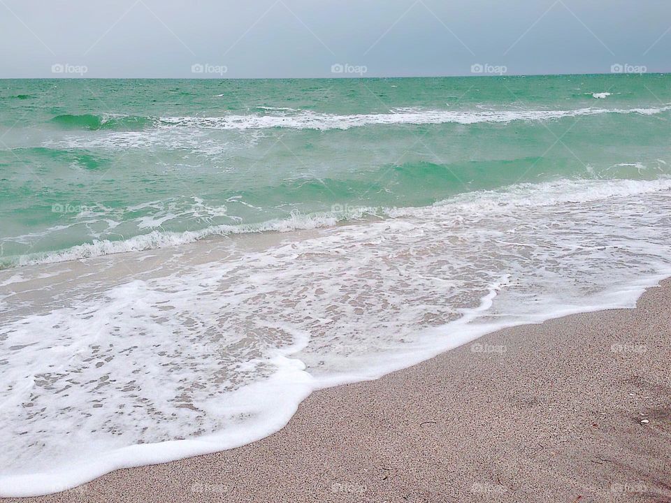 The magic of waves lapping the beach.