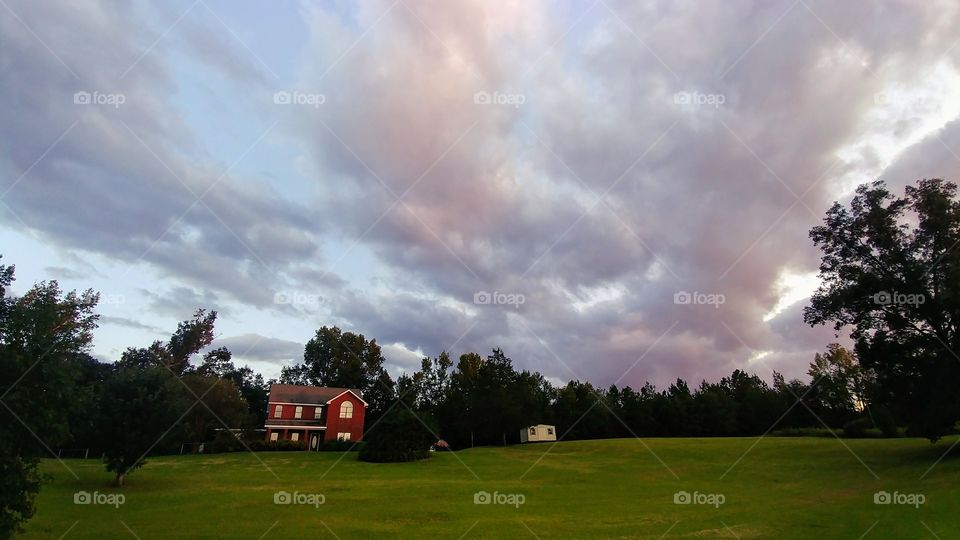 my house and clouds