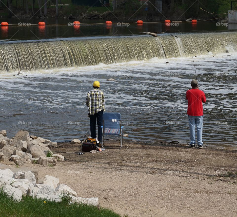 Fishing by the Falls. River Fishing 