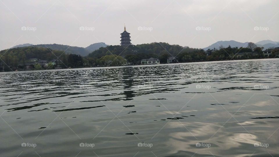 Leifeng Pagoda is a five-storey tower with eight sides, located on Sunset Hill south of the WestLake in Hangzhou, China. Originally constructed in the year AD 975, it collapsed in 1924 but was rebuilt in 2002.